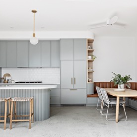 Split view of a stylish living room and a modern office space